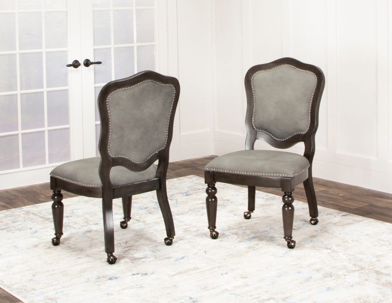Comfortable padded chairs with casters. 