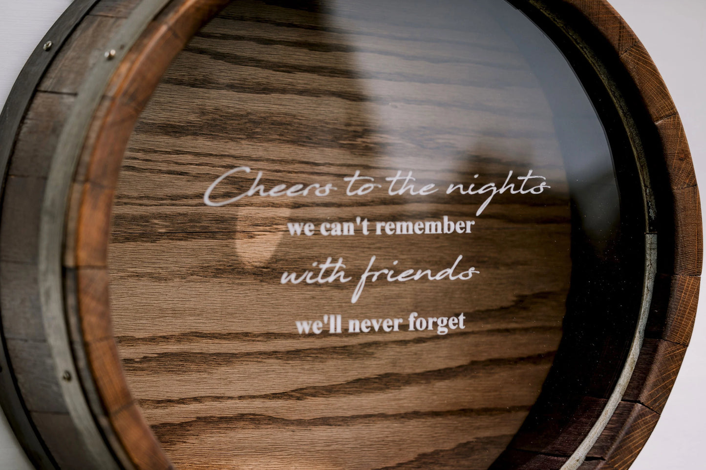 Close up of Ebony Finish "Cheers to the Nights we can't remember with friends we'll never forget"