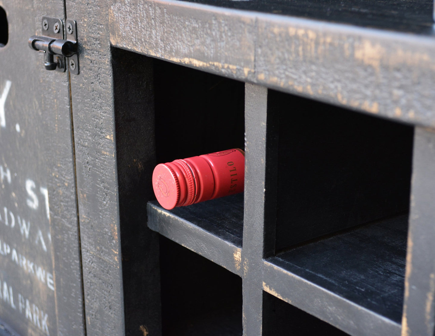 Close up of wine bottle in a storage compartment