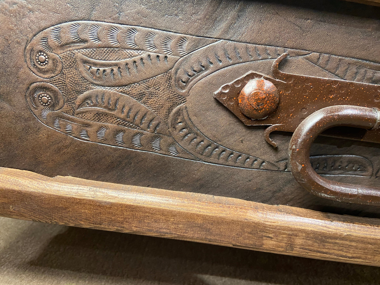Close up of detailed hand tooling. 