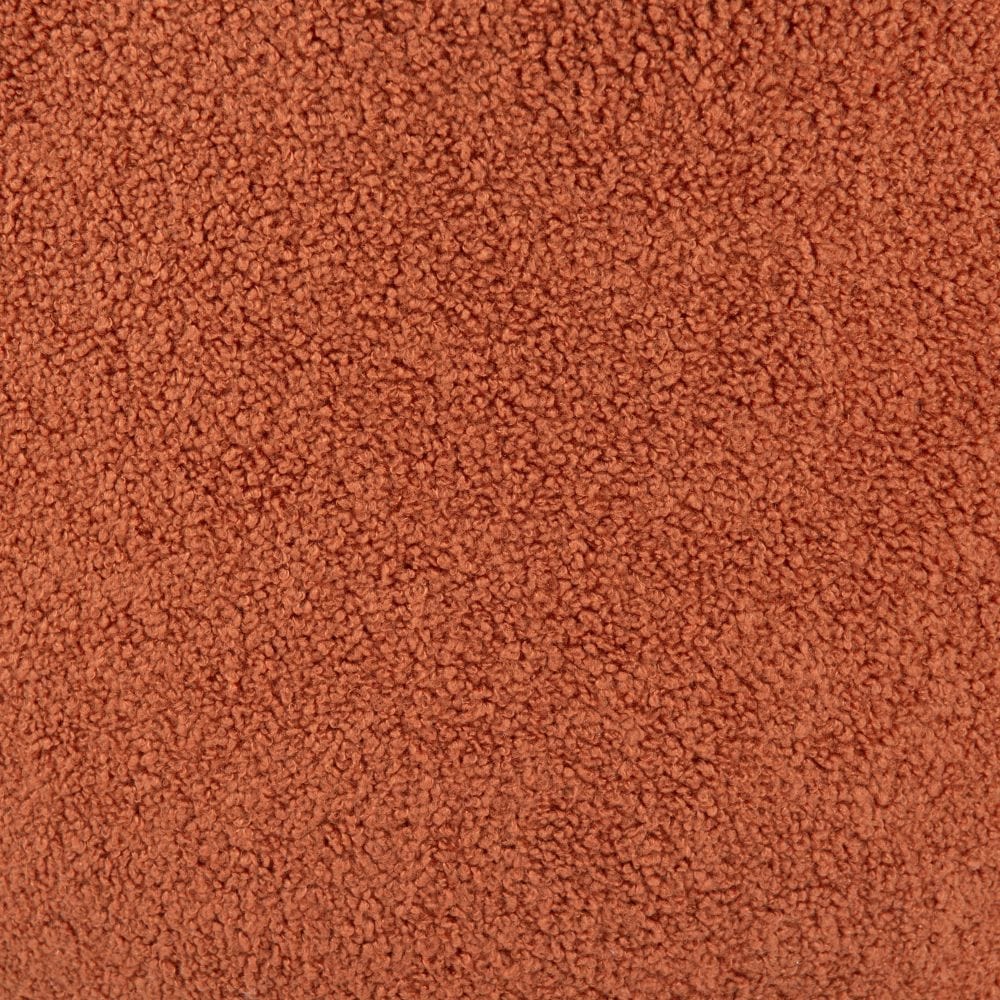 Close up of burnt orange seat